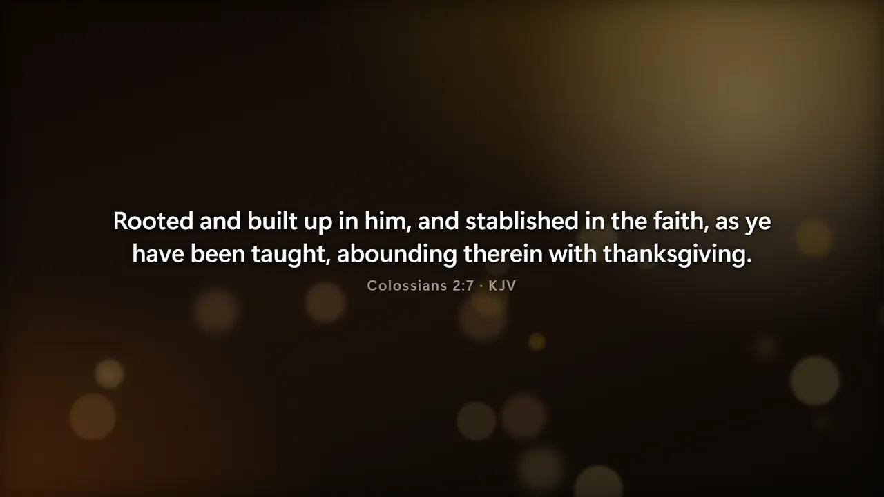 Colossians 2:7 on screen with its reference